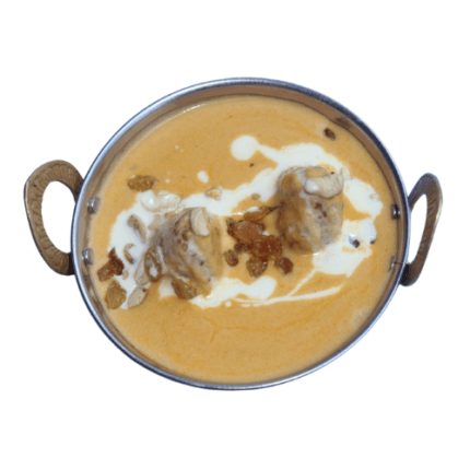 Tender chicken pieces cooked in a creamy, mildly spiced gravy made with yogurt, nuts, and aromatic spices.