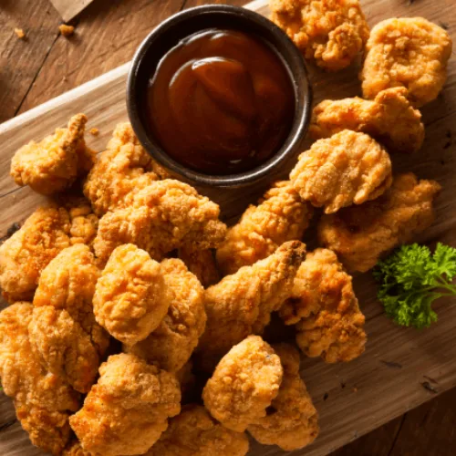 Crispy, bite-sized chicken pieces seasoned with flavorful spices and fried to golden perfection.