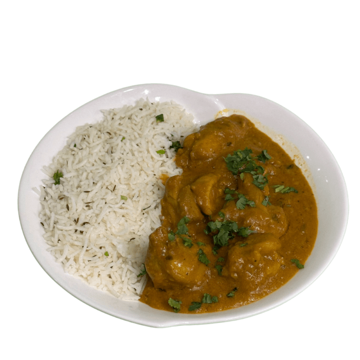 Tender chicken cooked in a spiced curry, served with rice and your choice of naan or roti for a complete meal