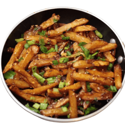Crispy potato strips tossed in a sweet and spicy honey-chili sauce, garnished with sesame seeds.