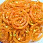 Jalebi Crispy - Tani Bistro Golden, spiral-shaped Jalebi dessert drizzled with syrup