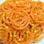 Jalebi Crispy - Tani Bistro Golden, spiral-shaped Jalebi dessert drizzled with syrup