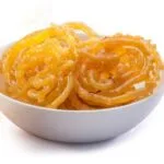 Jalebi - Tani Bistro Saffron-hued Jalebi served hot with syrup